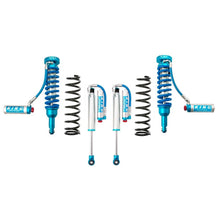 Load image into Gallery viewer, A blue off-road performance suspension kit with King Shocks KING 2 - 3 inch Lift Kit for 4Runner (03-09) and enhanced suspension articulation.