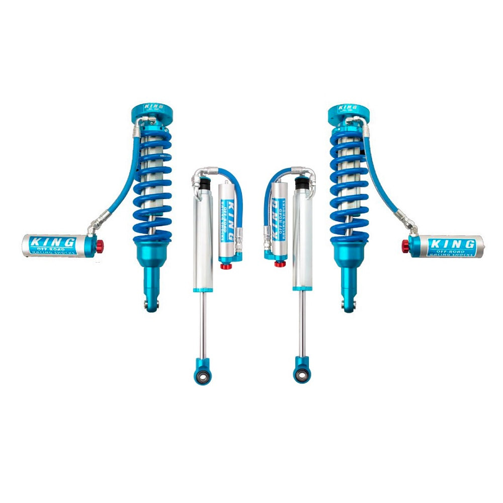 A set of blue King Shocks and springs, showcasing their off-road performance and advanced valving technology from the KING 2 - 3 inch Lift Kit for Lexus GX470 (03-09) by King Shocks, on a white background.