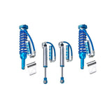 A set of blue King Shocks, featuring advanced valving technology, providing superior off-road performance, displayed on a white background.