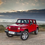 KING 1.5 - 2 inch Leveling Kit for Wrangler JK (07-18) installed on red Jeep with upgraded suspension and off-road tires