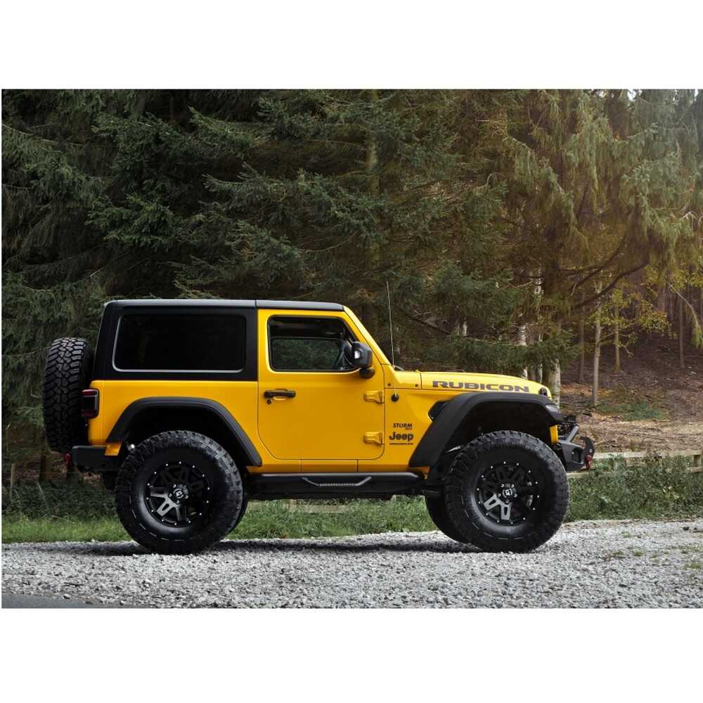 KING 1.5 - 2 inch Leveling Kit for Wrangler JL (18-23) on yellow Jeep Rubicon featuring King Shocks high-performance suspension components