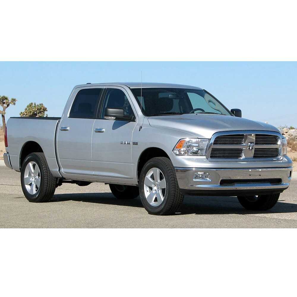 King Shocks KING 1.5 - 2 inch Leveling Kit for RAM 1500 (09-18) with heavy-duty suspension components on silver pickup truck