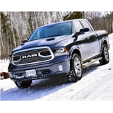 King Shocks KING 1.5 - 2 inch Leveling Kit for RAM 1500 (09-18) on dark gray 2015 Dodge RAM 1500 in snowy terrain