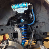 King Shocks KING 1.5 - 2 inch Leveling Kit for RAM 1500 (09-18) with high-performance remote reservoir coilover suspension assembly