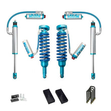 Load image into Gallery viewer, A set of King Shocks and springs for enhanced off-road performance and stability on a Toyota Tacoma, featuring the KING 2 - 3 inch Lift Kit for Tacoma (05-23) from King Shocks.
