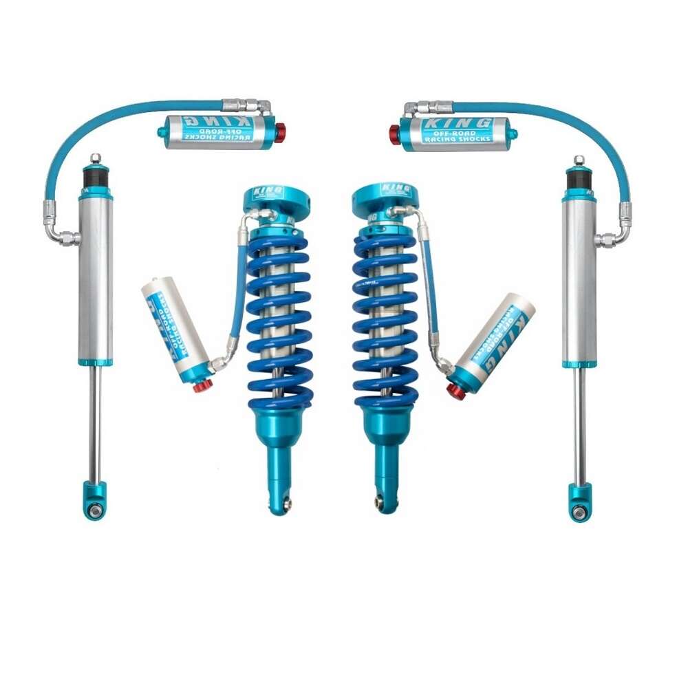 A set of blue King Shocks for enhanced stability and off-road performance, such as the KING 2 - 3 inch Lift Kit for Tacoma (05-23) by King Shocks.