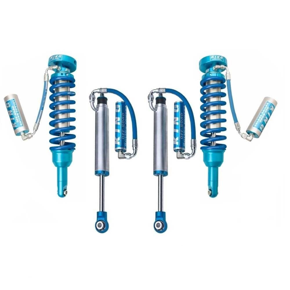 A set of blue King Shocks on a white background, providing enhanced stability for off-road performance - KING 2 - 3 inch Lift Kit for Tacoma (05-23) by King Shocks.