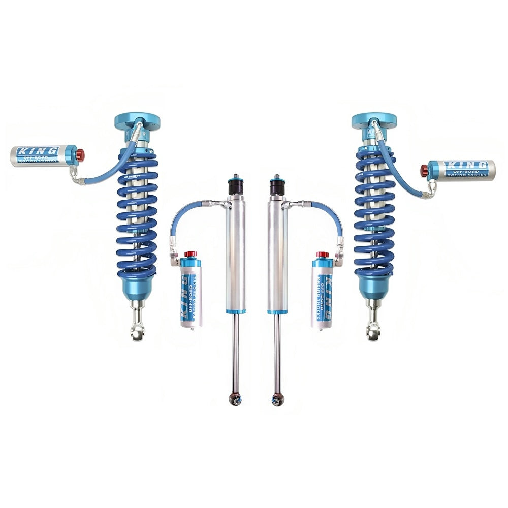 A set of blue King Shocks and Springs on a white background, providing stability and enhancing off-road performance.