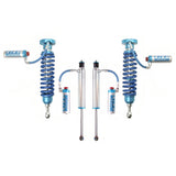 A set of blue King Shocks and Springs on a white background, providing stability and enhancing off-road performance.