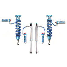 Load image into Gallery viewer, A set of blue King Shocks and Springs on a white background, providing stability and enhancing off-road performance.