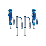 A set of blue King Shocks providing stability and off-road performance on a white background.