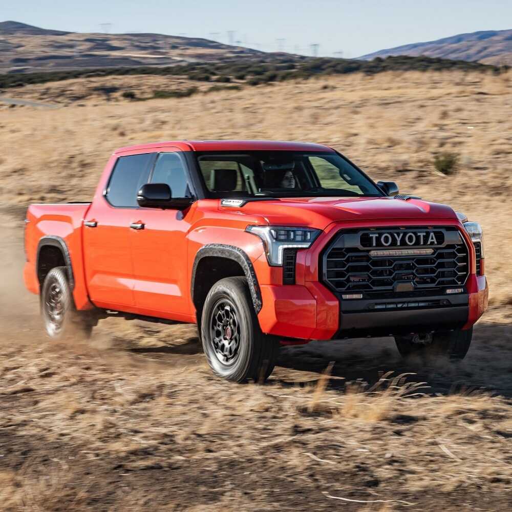 King Shocks KING 0 - 2 inch Leveling Kit for Tundra (22-ON) with heavy-duty suspension components on red 2022 Toyota Tundra off-road
