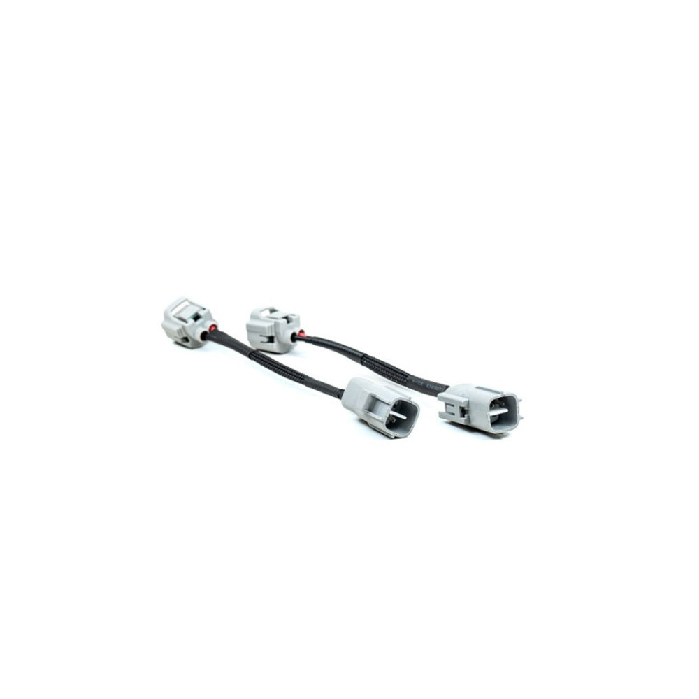 A pair of Morimoto XB Led Headlights Adapters LF531H-2 for Toyota 4Runner (2020-2023) wired on a white background.