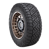 Nitto RECON GRAP 285/65R18 116T 32.6 all-terrain tire with aggressive tread for enhanced off-road traction and durability