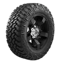 Nitto Trail Grappler - 285/65-18 tire with aggressive all-terrain tread on black off-road wheel for 4x4 vehicles