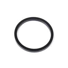 Load image into Gallery viewer, A black rubber ring on a white background featuring the Assembly - OME Front Trim Packer Fitting Kit OME95PF5-ASS for Toyota Land Cruiser 200 Series, Land Cruiser 120 Series, Land Cruiser 150 Series logo by Old Man Emu.