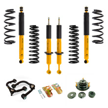 Load image into Gallery viewer, An Old Man Emu OME 3 inch Lift Kit for FJ Cruiser (10-ON) - Front Shocks Assembly with springs that enhances ground clearance and improves the overall suspension system.