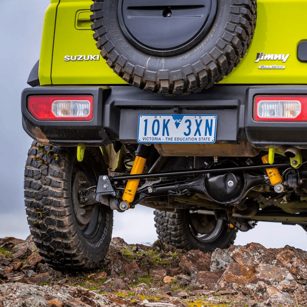 OME Nitro+ 2.5 inch Lift Kit for Suzuki Jimny (18-ON) with heavy-duty yellow shocks and enhanced off-road suspension components