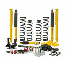Load image into Gallery viewer, A yellow OME 4 inch Lift Kit for Wrangler JK 2 Door (07-18) designed for optimizing ground clearance, featuring high-performance springs and incorporating the renowned Old Man Emu technology.