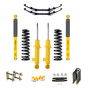 A yellow Old Man Emu Prado suspension kit with Nitrocharger shocks and increased ground clearance.