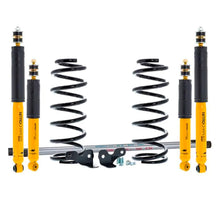 Load image into Gallery viewer, A suspension kit with the OME 2 inch Lift Kit for LandCruiser 100 Series, Lexus LX470 (98-07 Diesel Models) from Old Man Emu suspension system and Nitrocharger shocks, designed to provide improved ground clearance.
