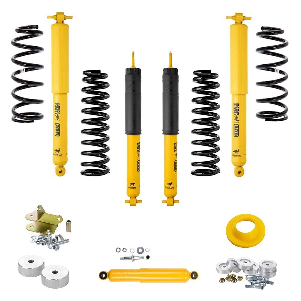 A yellow OME 2 inch Lift Kit for Wrangler LJ / TJ Unlimited (03-06) with Old Man Emu suspension system and Nitrocharger shocks for increased ground clearance.