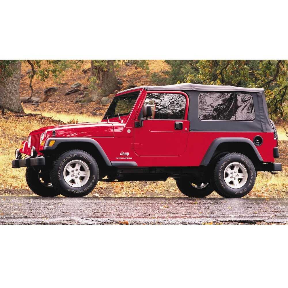 A red Old Man Emu jeep with the OME 2 inch Lift Kit for Wrangler LJ / TJ Unlimited (03-06) is parked in the rain.