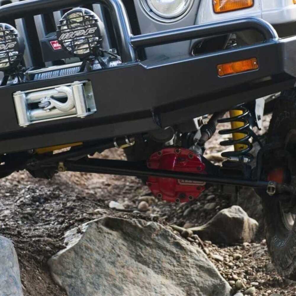 Old Man Emu Nitro+ 2 inch Lift Kit for Wrangler LJ / TJ Unlimited (03-06) showing heavy-duty coil spring and red differential cover