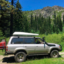 Load image into Gallery viewer, Old Man Emu 2 inch Lift Kit for Lexus LX450 (96-97) with increased ground clearance and Nitrocharger shocks.