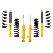 Load image into Gallery viewer, A yellow OME 2 inch Lift Kit for Montero Sport (15-21) with Old Man Emu Nitrocharger shocks and increased ground clearance.