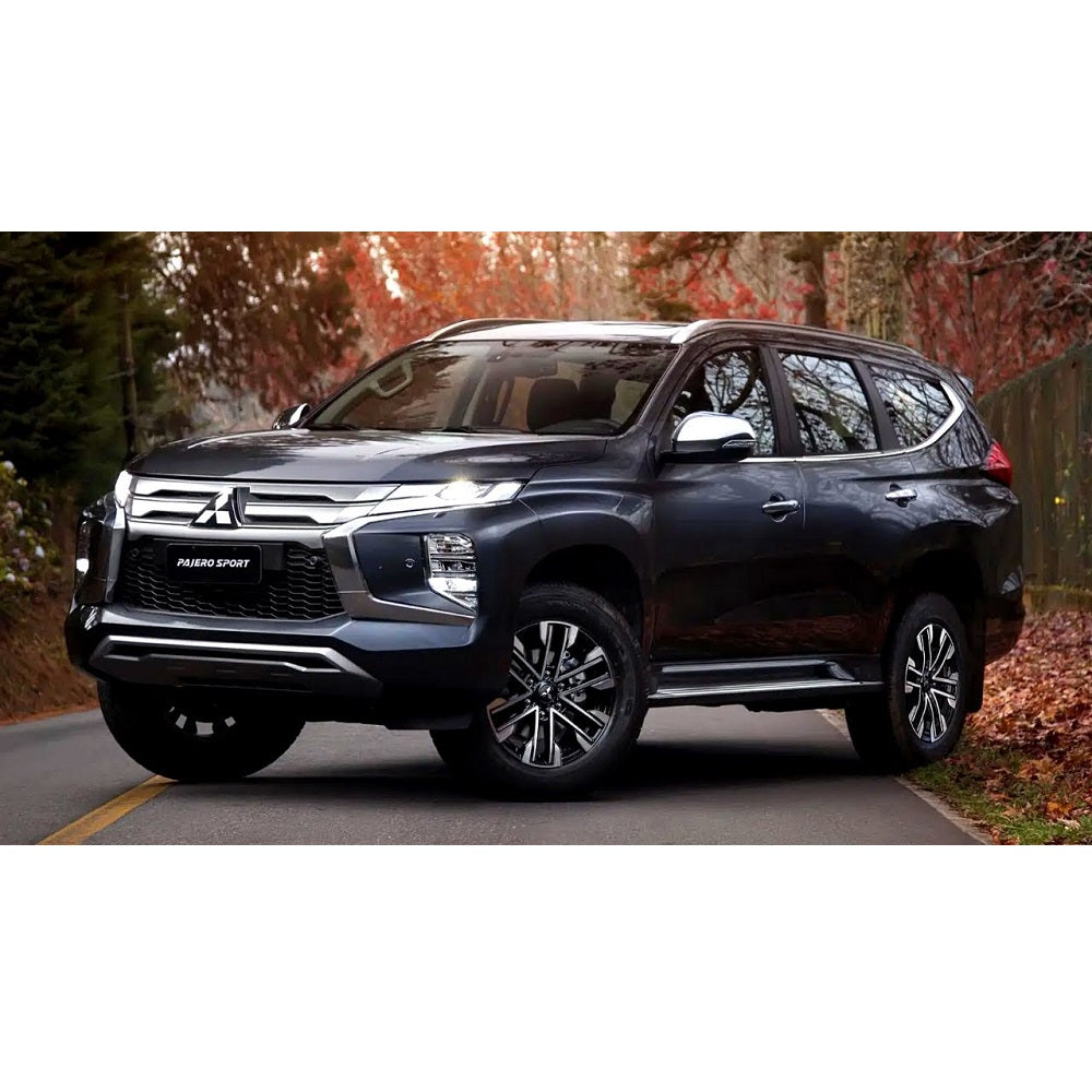 Old Man Emu Nitro+ 2 inch Lift Kit for Montero Sport (15-21) installed on dark blue lifted sport utility vehicle