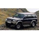 An OME 2 inch Lift Kit for Patrol Y61 (99-09)-equipped Nissan Patrol parked on a rocky hillside, showcasing its impressive ground clearance and rugged Old Man Emu suspension system.