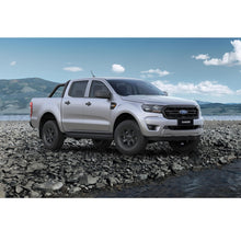 Load image into Gallery viewer, The 2019 Ford Ranger, equipped with the OME 2 inch Lift Kit for Ranger PX3 (18-ON) by Old Man Emu, is parked on a rocky beach.
