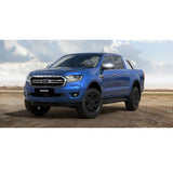 A blue Ford Ranger parked on a dirt road with an Old Man Emu OME 2 inch Lift Kit for Ranger PX3 (18-ON) providing increased ground clearance.