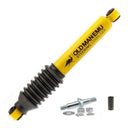 A yellow Old Man Emu shock absorber with a bolt and nut, designed for performance improvements in load carrying capacity.