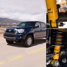 Load image into Gallery viewer, An OME 3 inch Essentials Lift Kit for Tacoma (05-15)-upgraded Toyota Tacoma cruising on a road, displaying its enhanced suspension system for improved ground clearance.