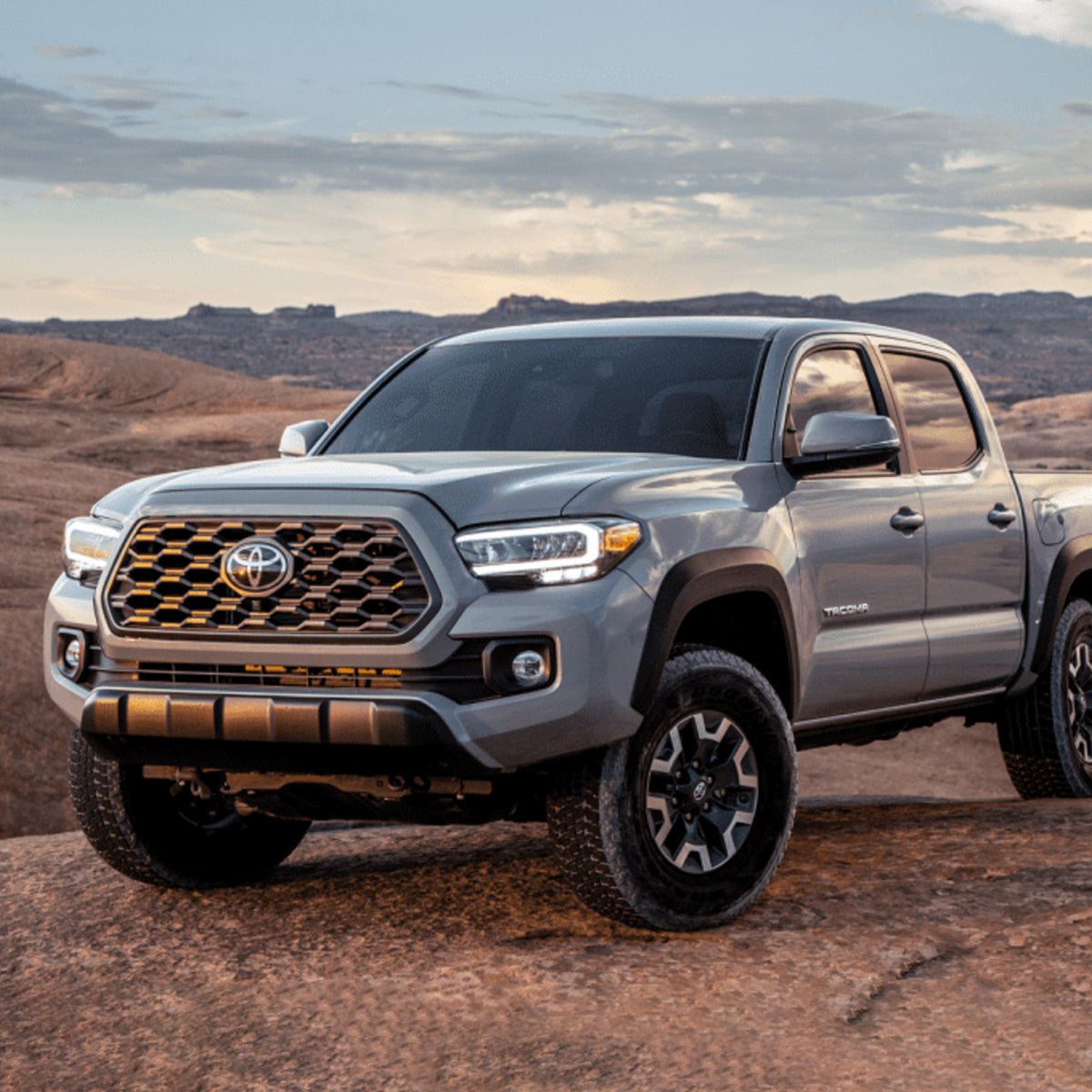 OME Nitro+ 2 inch Leveling Kit for Tacoma RWD (16-23) with Assembled Front Shocks installed on lifted gray Toyota Tacoma truck off-road