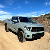The 2019 Toyota Tundra is equipped with an exceptional suspension system, featuring the Old Man Emu 2.5 inch Lift Kit for Tundra (07-21). This powerful combination ensures a smooth and stable ride, even when navigating through challenging terrain.