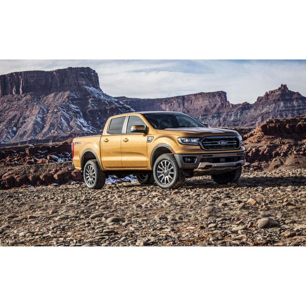 KING 2-3 inch Leveling Kit for Ranger (19-ON US Model) installed on yellow Ford Ranger off-road terrain background