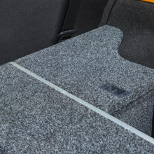 Load image into Gallery viewer, An ARB Roller Drawer Side Floor Kit RD945FK vehicle specific back seat with a grey carpet.