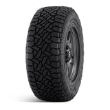 OME 2.5" Lift Kit + 17" Fuel Wheels & Tires Package for Tacoma (16-23) showing rugged off-road tire tread and beadlock-style wheel