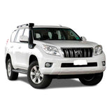 A white Toyota Land Cruiser, equipped with a Safari ARB Safari 4x4 Snorkel SS188HF for Toyota Prado 150 Series, is parked on a durable material white background.