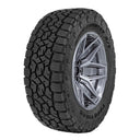 Toyo Open Country AT3 - LT255/80-17 all-terrain tire with aggressive tread on 17-inch alloy wheel for off-road SUVs and trucks
