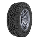 Toyo Open Country AT3 - LT255/80-17 all-terrain tire with aggressive tread on 17-inch alloy wheel for off-road SUVs and trucks