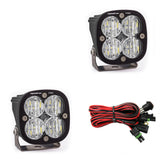 Baja Designs Squadron Pro Series Wide Cornering Pattern LED Light Pods with wiring harness and stainless steel mounting brackets for off-road use