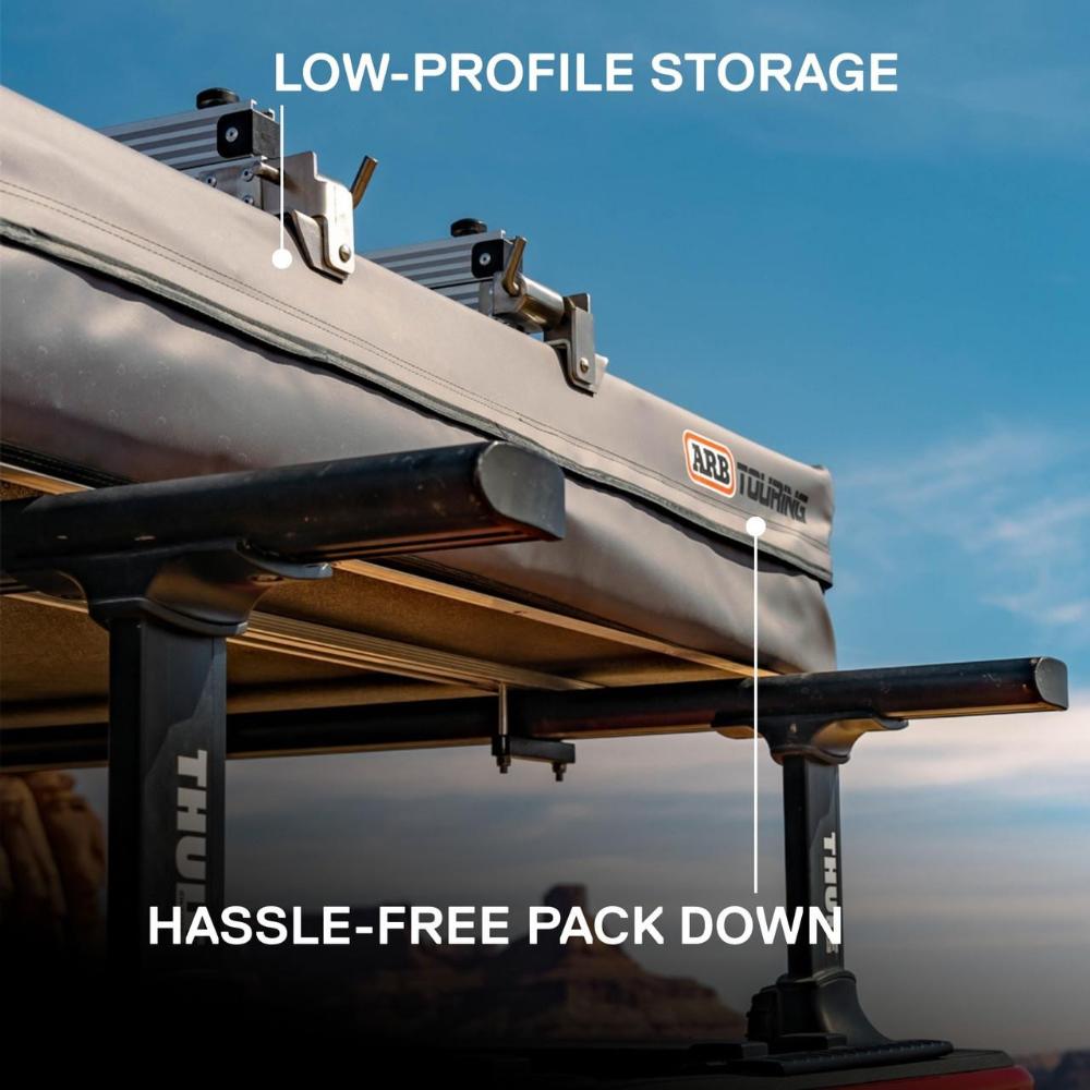 ARB Flinders Rooftop Tent 803300A mounted on Thule crossbars with low-profile storage and compact fold design
