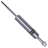 A Bilstein B8 6112 Series Front Shock bil47-309975 for Toyota 4Runner 03-09, Tacoma 05-23, Lexus GX470 03-09, FJ Cruiser 07-09 with a metal handle, providing stability and durability against a clean white background.