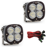 Baja Designs XL80 Series Wide Cornering Pattern LED Light Pods with black housing, adjustable stainless steel mounts, and wiring harness