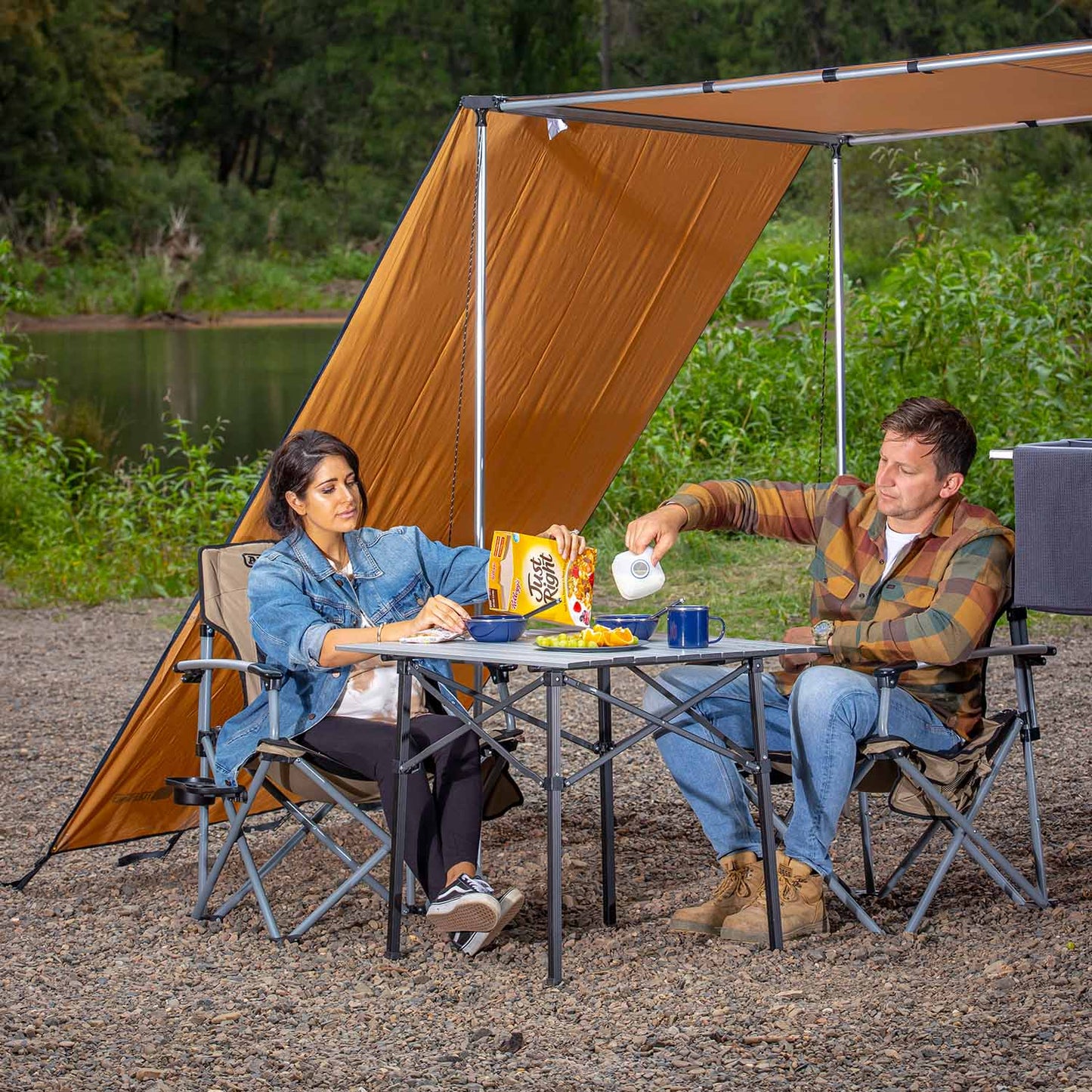 ARB Compact Aluminum Camp Table 10500130 with lightweight aluminum frame and foldable legs set up for outdoor camping use