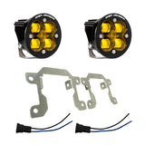 Baja Designs 2019+ Ram 2500/3500 Big Horn Fog Pocket Kit - Amber with dual amber LED fog lights and steel mounting brackets